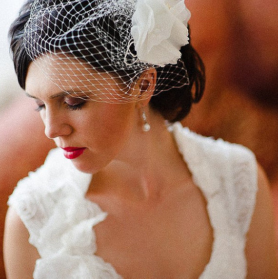 A birdcage veil is a lovely alternative to the traditional veil