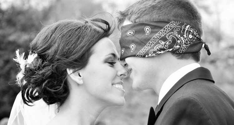 A sweet blind folded first look kiss is perfect - weddingfor1000.com
