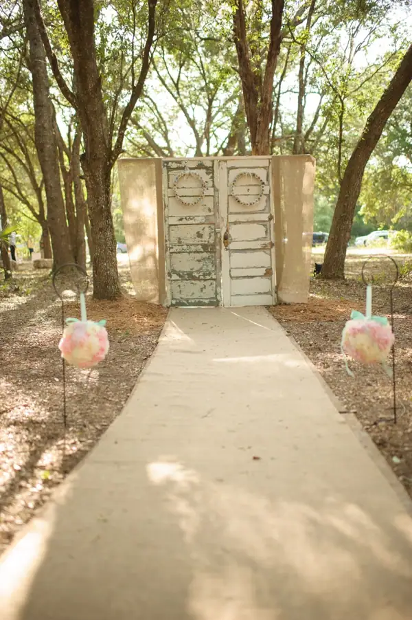 repurposed doors ceremony backdrop weddingfor1000.com