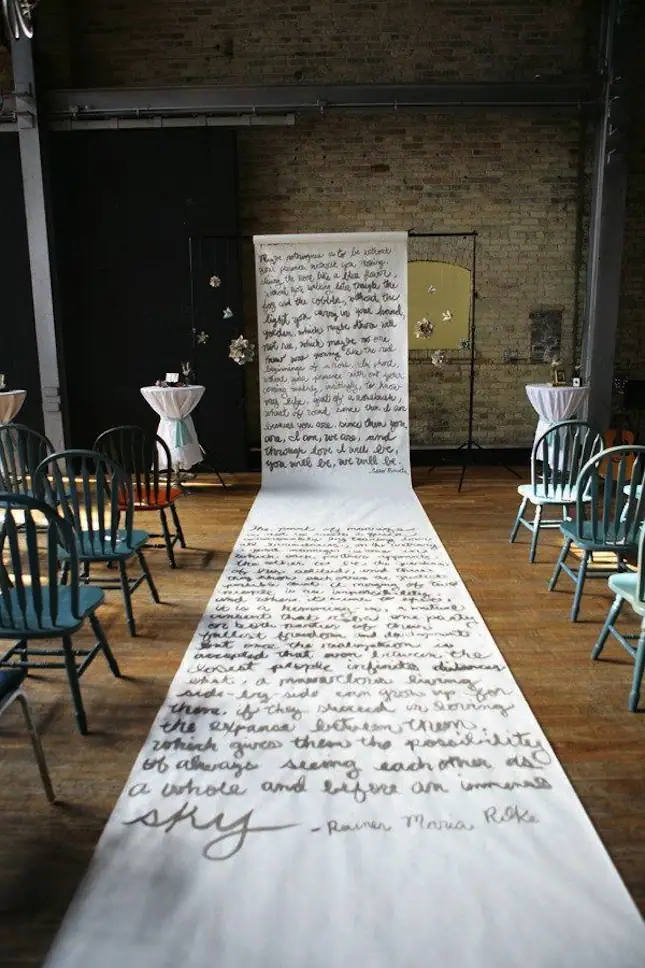 words on paper ceremony backdrop and aisle runner weddingfor1000.com